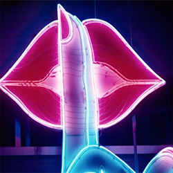 růžová a modrá neonová světla ve tvaru úst a prstu ukazujícího pst